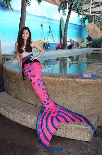 Pool side with Crystal Santos, a Mermaid