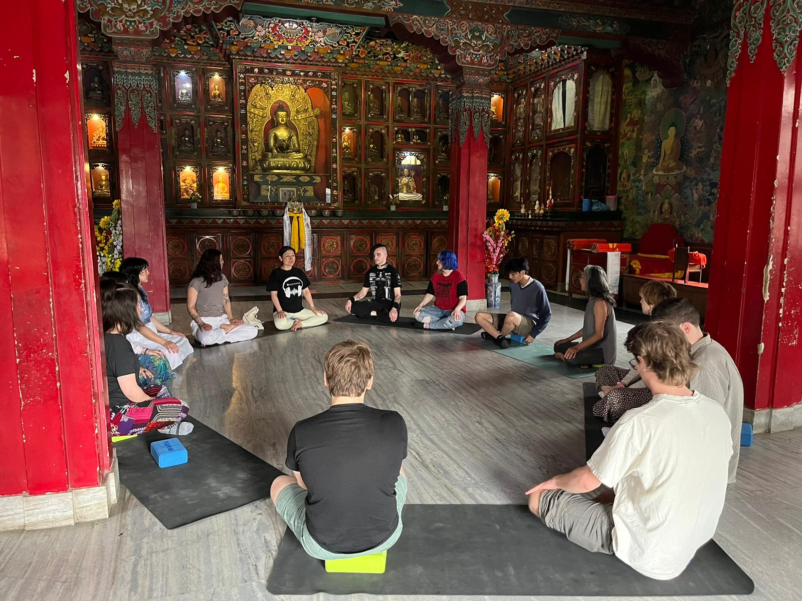 Nepal OGE program-students meditating in temple