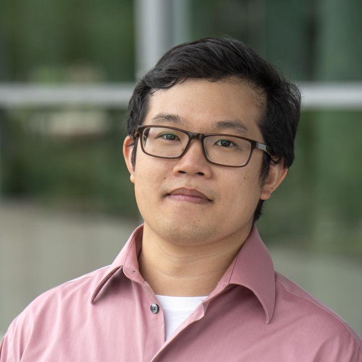 Headshot of Morris Huang from the shoulders up in business shirt
